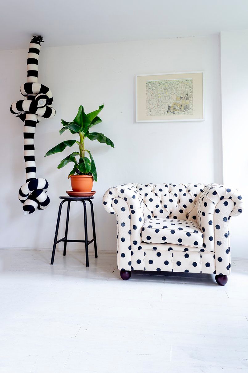 Polka dot chesterfield at the home of Annebet Philips