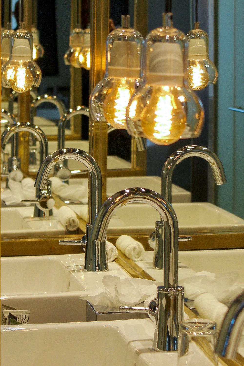 brass bathroom at the ink hotel amsterdam