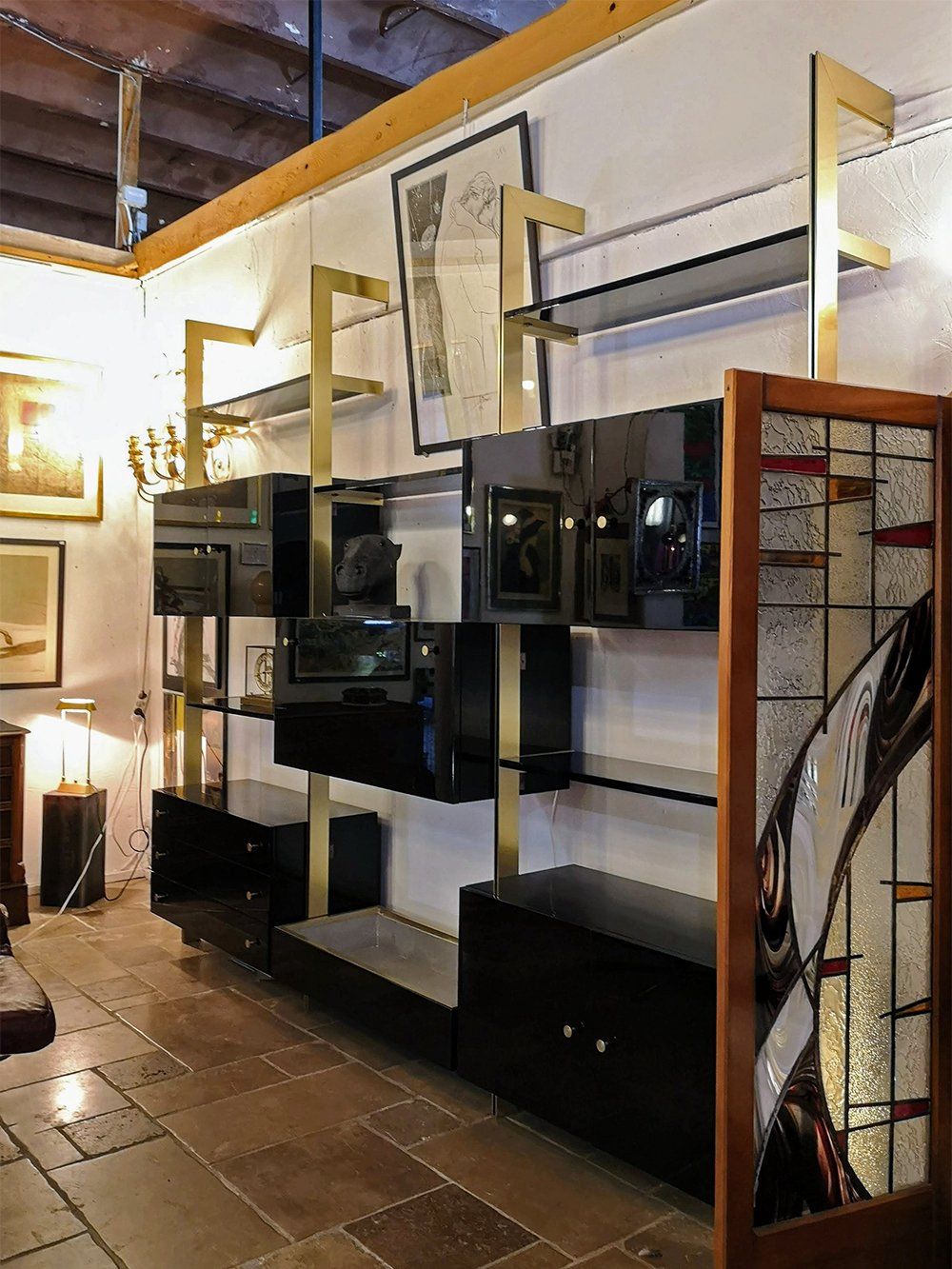 Seventies black lacquered brass shelving system