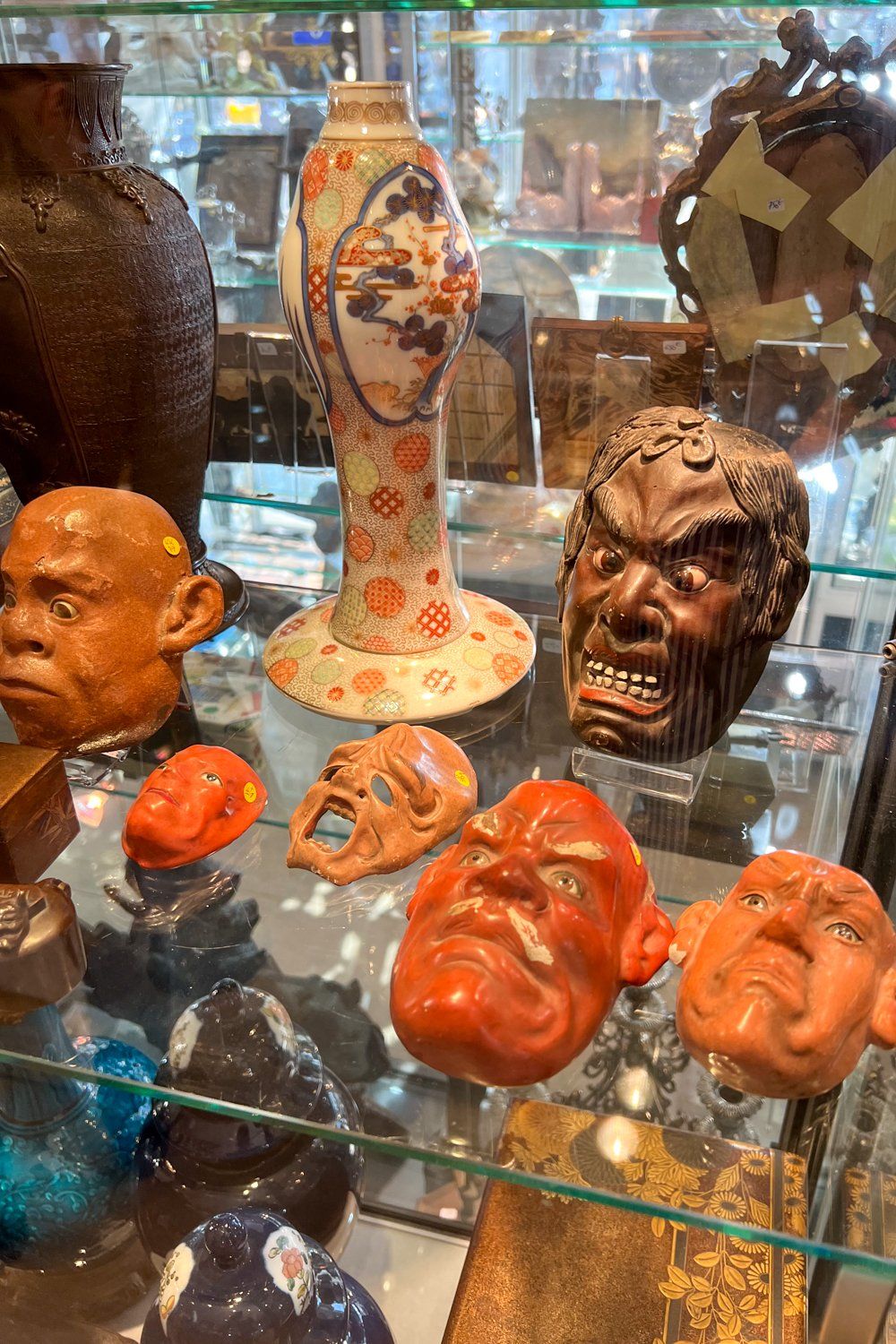 Ceramic masks at the Foire de Chatou